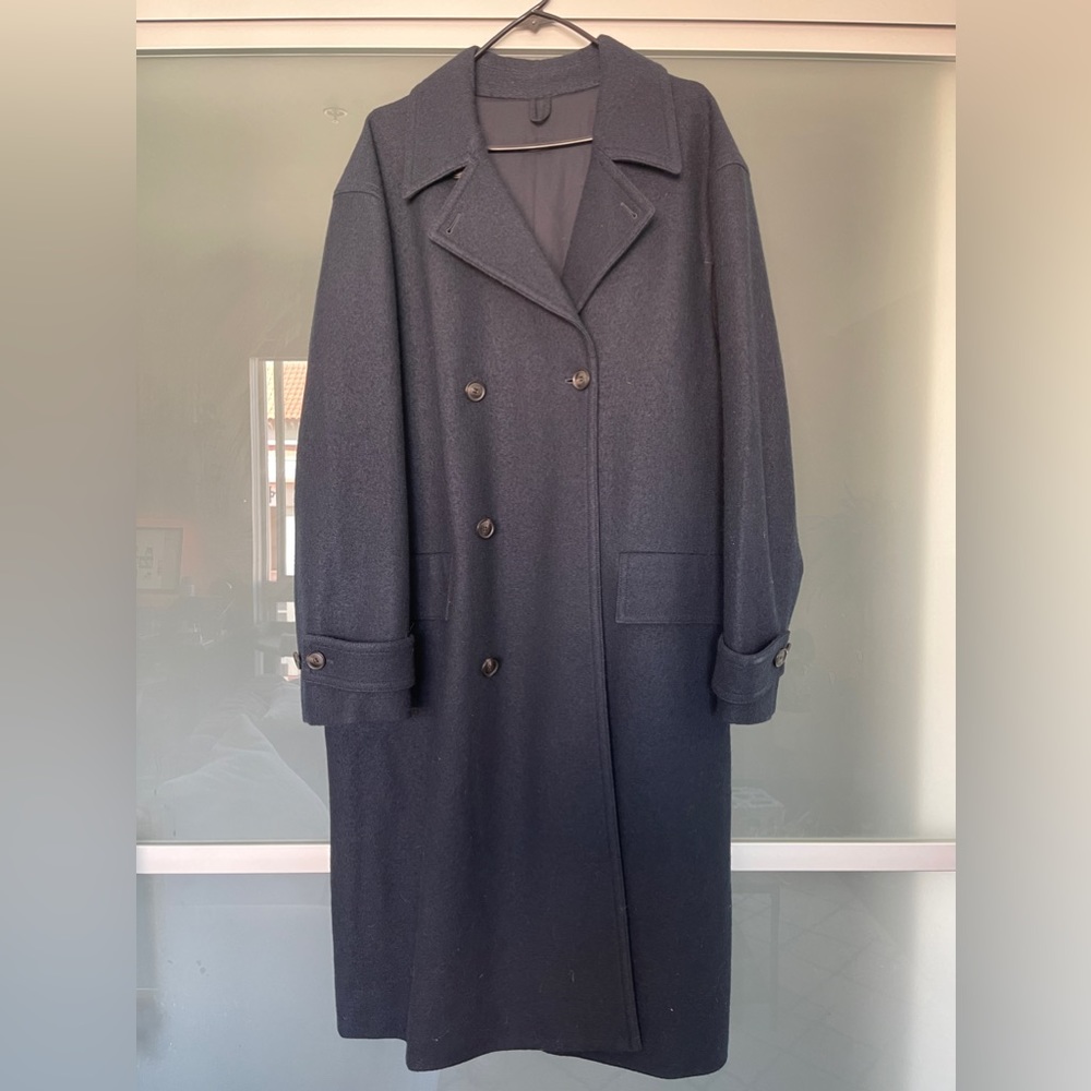 Navy blue coat NEVER been worn.